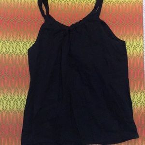 Cute black shirt with eyelet opening in the front